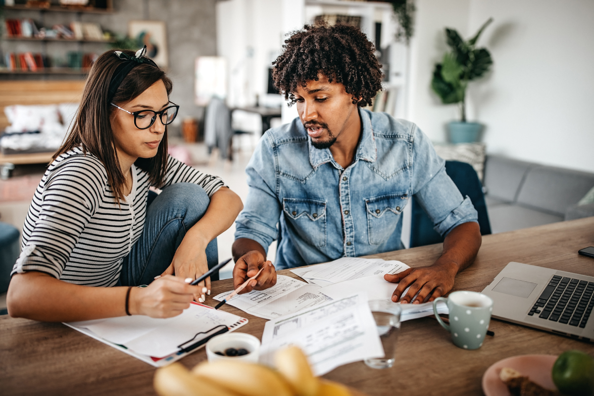 Couple discussing their finances and debts